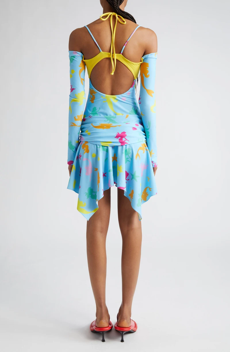 Model wearing the printed Little Mermaid dress, back view.