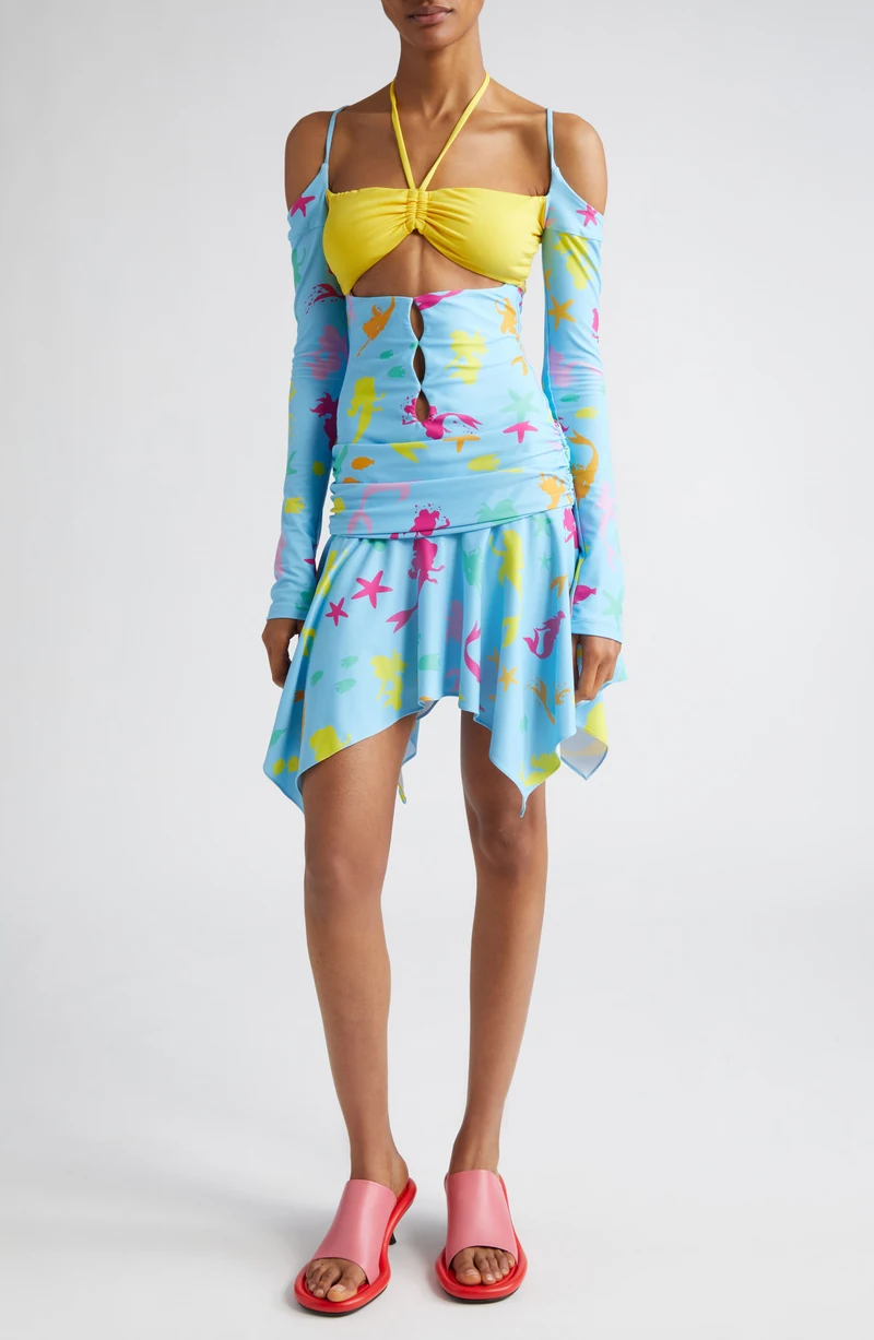 Model wearing the blue and yellow printed Little Mermaid dress, front view.