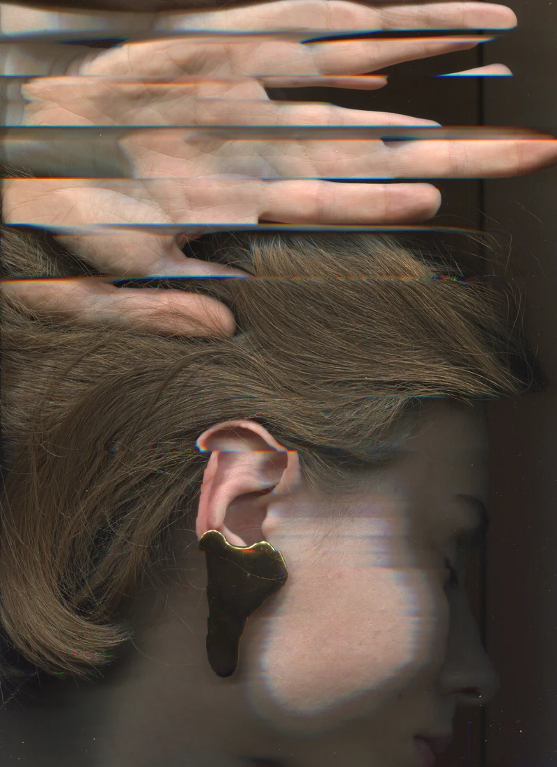 Portrait print study with displaced facial features and hands