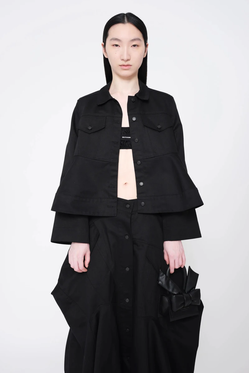 Black cropped jacket and wide trousers