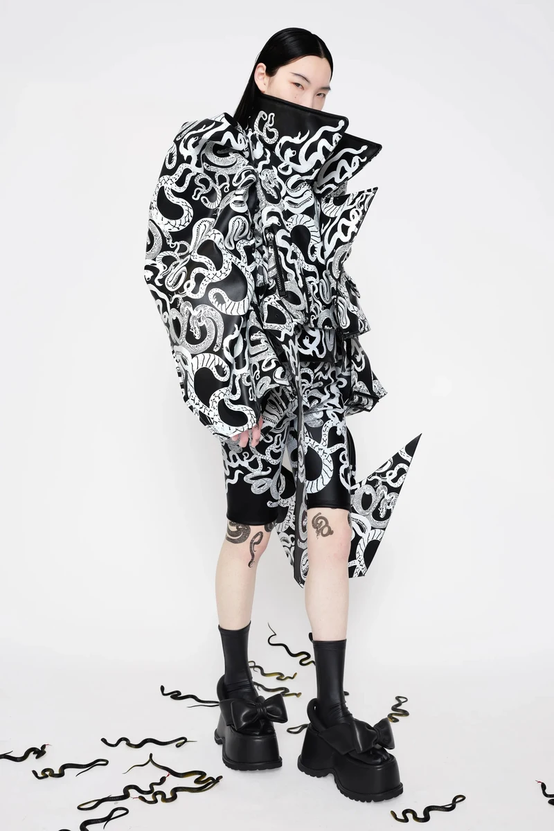 Black-and-white snake-print sculptural jacket and shorts