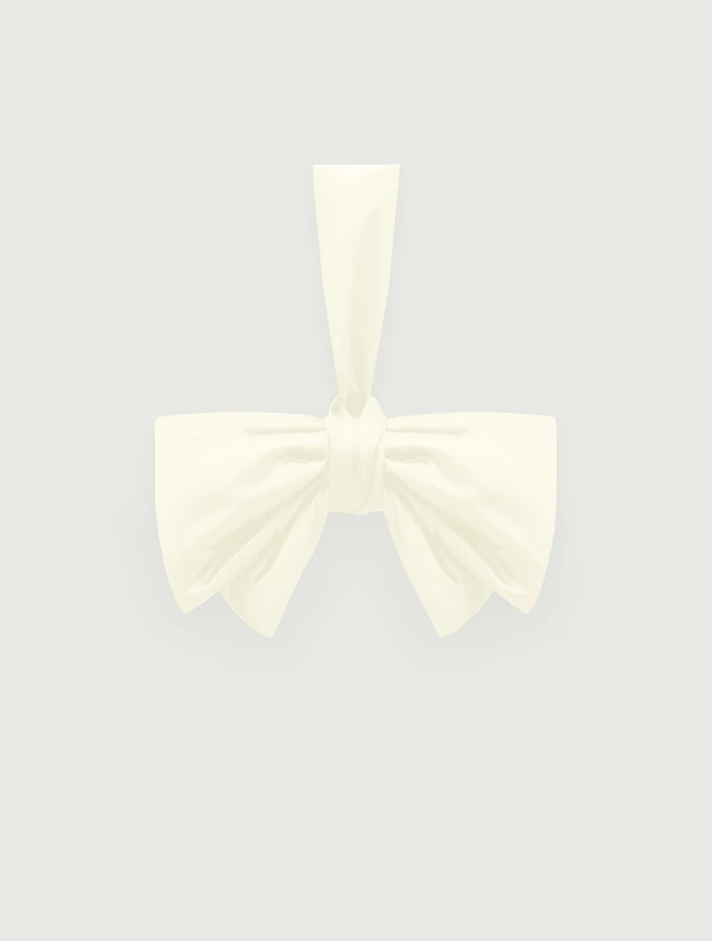 Ivory bow bag with a loop handle