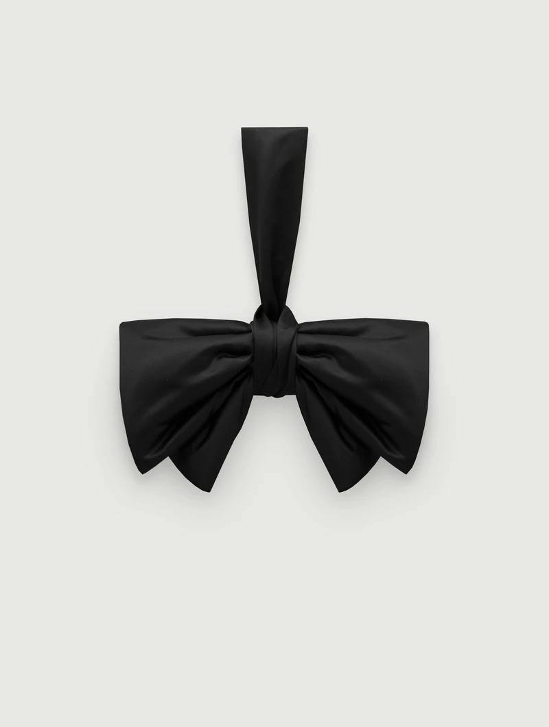 Black bow bag with a loop handle