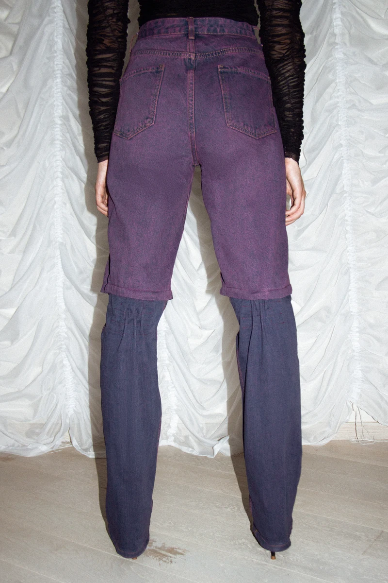 Purple trousers with contrasting extended legs