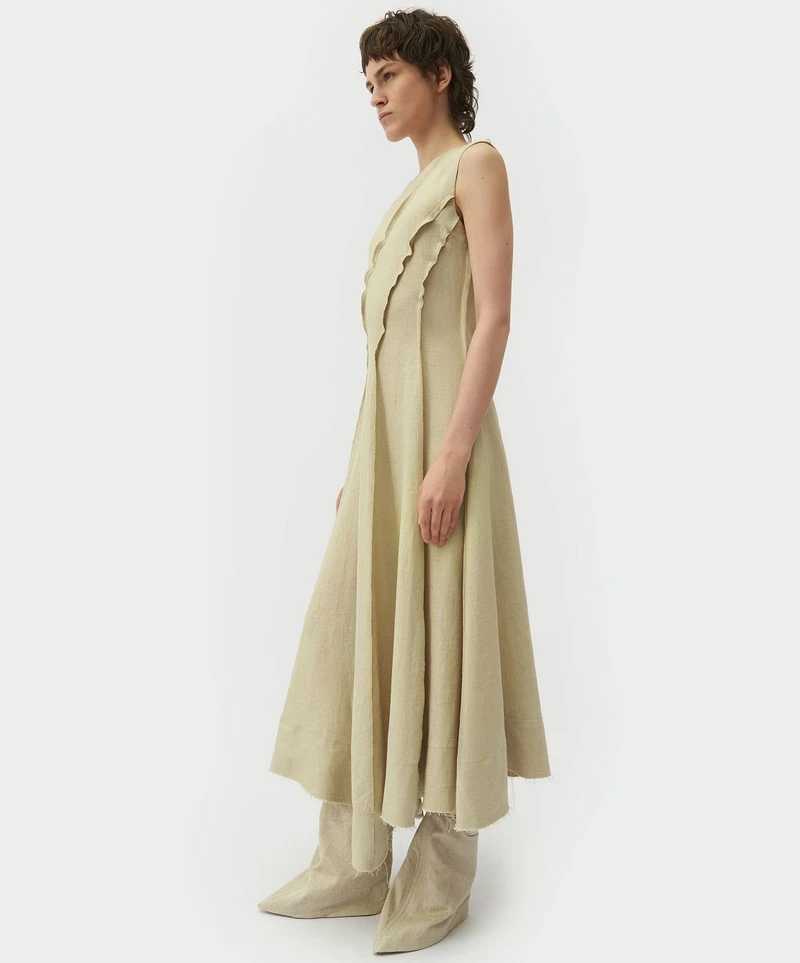 Cream spiral-cut dress with trousers, side view