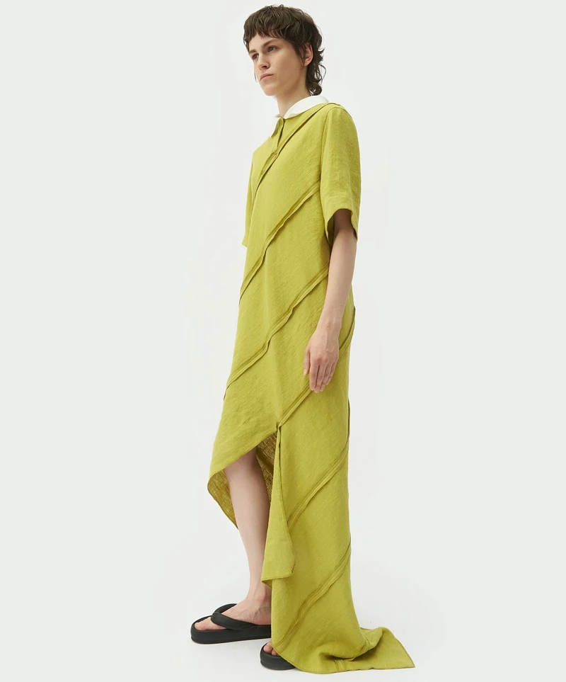 Yellow spiral-cut shirt dress, side view